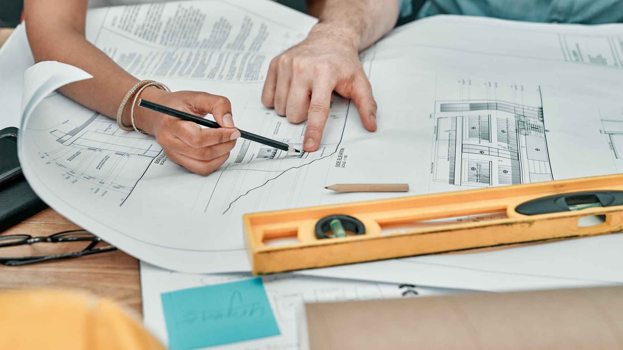 EOT, LLC | Working on blueprint plans