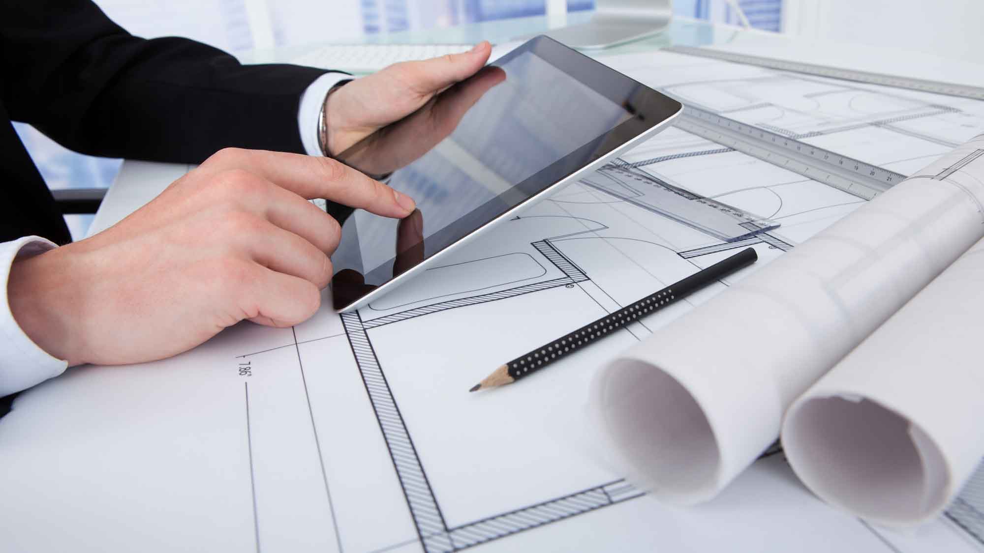 EOT, LLC | Working on blueprint plans